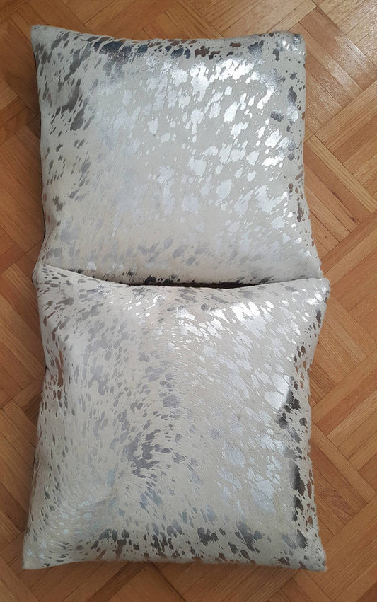 Very beautiful and exotic silver metallic cowhide cushion covers, perfect for any modern or rustic interior, just the touch a house is looking for.