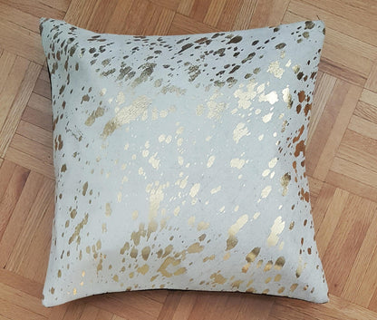 These metallic cowhide pillows are wonderful! add them to your husband’s office chairs and we love them.

