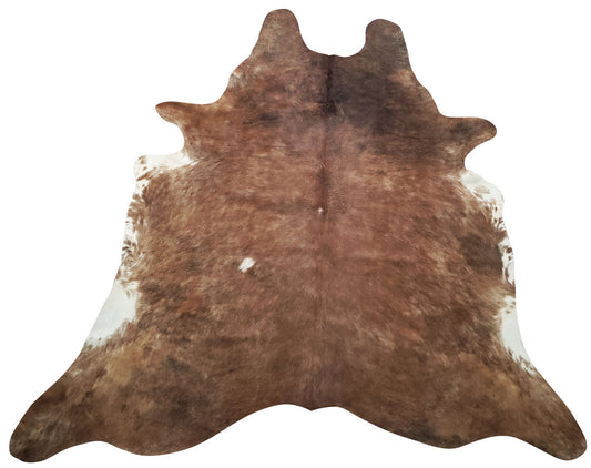 This solid brown cowhide rug will stand out in any busy space from a ranch to a home office, there’s a nice mix of textures between natural shades.