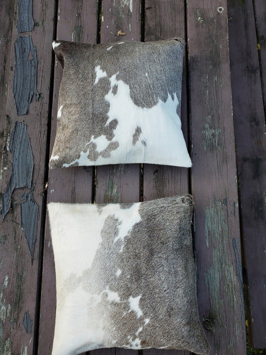 Two 20 X 20 grey cowhide cushion covers very soft and smooth. 