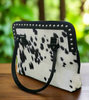 Black White Cowhide Handbag With Rivets