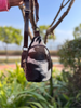 Cowhide sling bag with adjustable leather shoulder strap