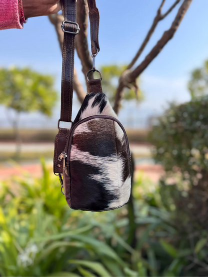 Cowhide sling bag with adjustable leather shoulder strap