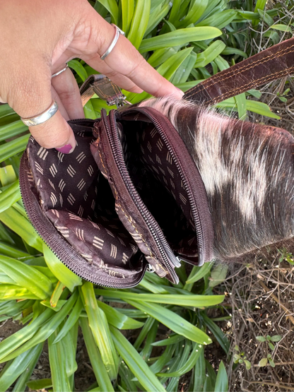 Cowhide sling bag with adjustable leather shoulder strap