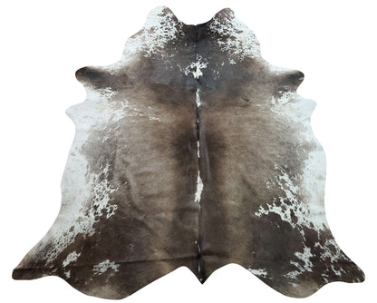 This cowhide rug is an accessory for a couples shoot. Unfolding this natural cowhide will be an experience you will never forget. 
