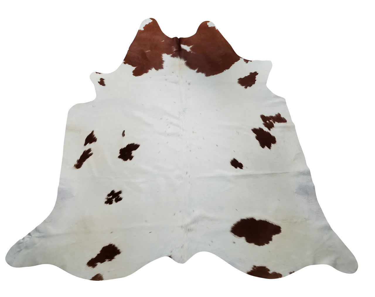 The cowhide rug fits living room perfectly, brown white natural marking lightens the space and warms it up. It will be an awesome cow hide