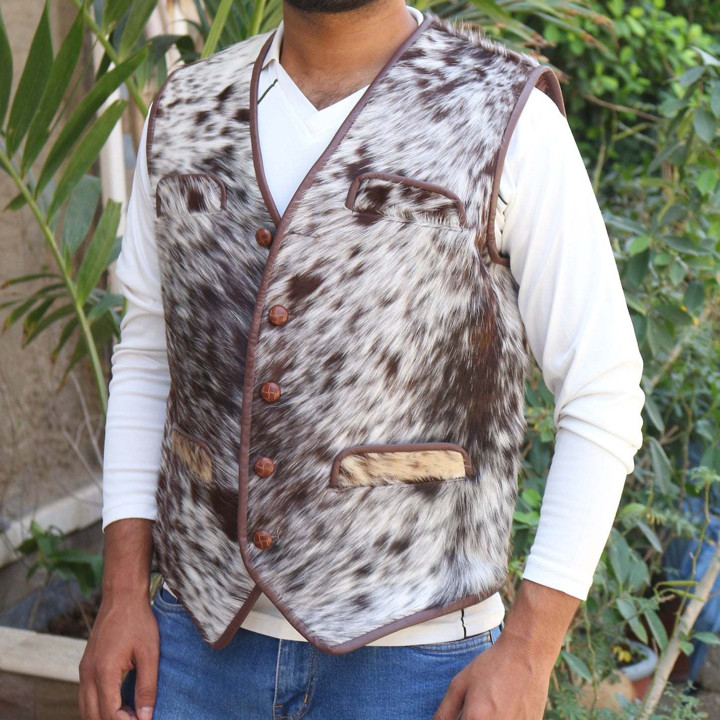 Shop a brown white cowhide vest women’s style with authentic hair-on leather and a cowboy-inspired silhouette for daily wear or themed events.