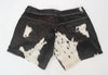 Genuine cowhide shorts for women with bold brown and white hair-on-hide texture. Great for western wear, ranch life, and Calgary rodeo outfits.








