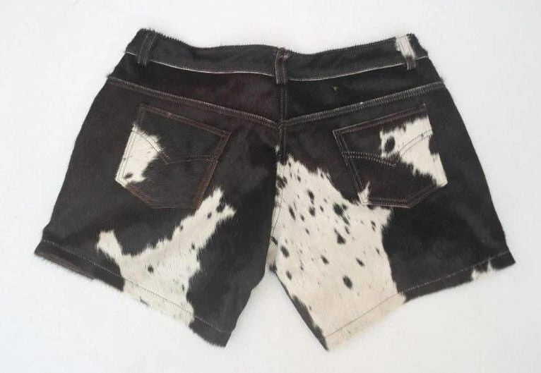 Genuine cowhide shorts for women with bold brown and white hair-on-hide texture. Great for western wear, ranch life, and Calgary rodeo outfits.








