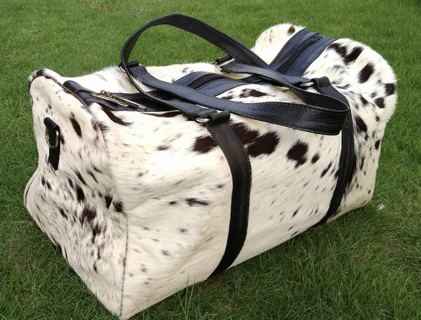 Real cow skin duffel bags in black white
