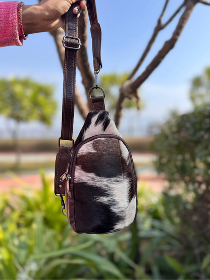Cowhide sling bag with adjustable leather shoulder strap