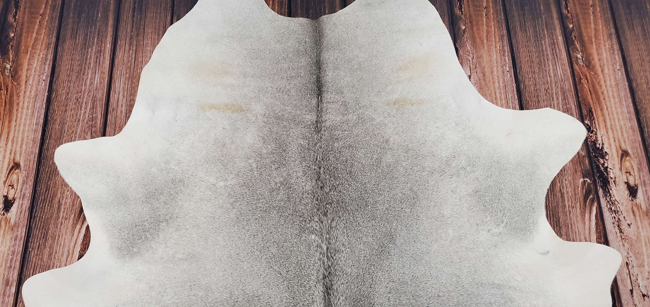 We are decor hut have hundreds of new cowhide rugs in Canada and it come in a variety of colors and styles, so you're sure to find one that fits your taste. They're also durable and easy to care for, making them a great choice for high-traffic areas.
