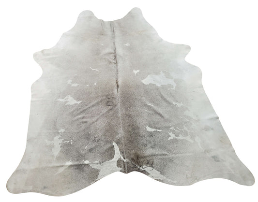 Our exotic cowhide rugs mostly white with striking grey in the background, hypoallergenic making cowhides great for pets and sturdy, not flimsy
