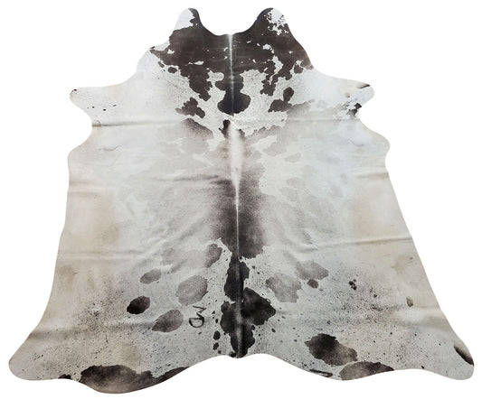 A large cowhide rug with deep and rich texture can enhance look of any space, grey white is bright and bold with vibrant feel and free shipping Canada
