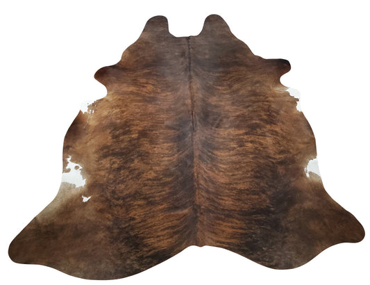 This brown cowhide rug lovely, it will bring the living room together. A perfect love child between sleek Scandinavian style and bohemian. 