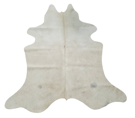 This extra small cowhide rug is soft and feels good underfoot, the cream shade is perfect for any space, it would also look terrifically hung on a wall.