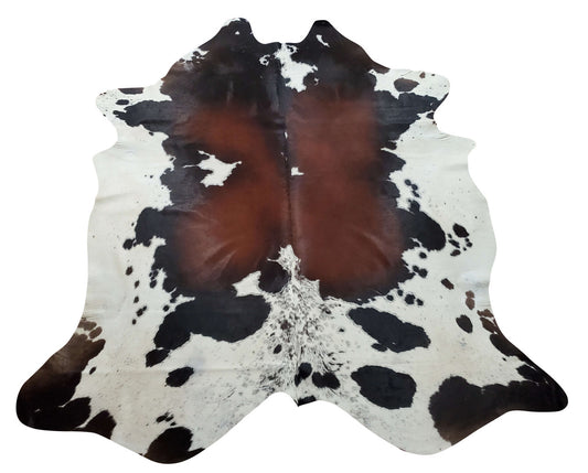 Absolutely beautiful dark tobacco cowhide rug the brown color is gorgeous for warm and cozy living room or in front of the fireplace. 

