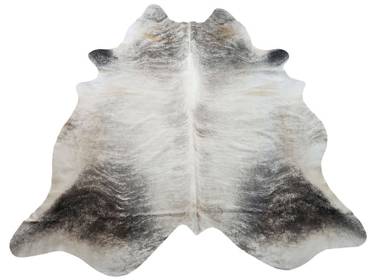 This xxl cowhide rug is exotic and unique with brindle pattern with hints of grey for your kitchen or dining room
