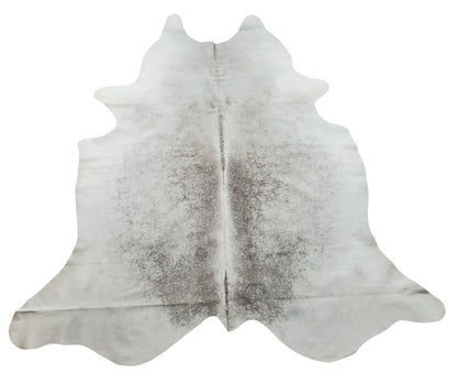 A new cowhide rug with mix of dark grey for foyer or layered with mid century modern carpet, these large cowhides are unique and exotic.
