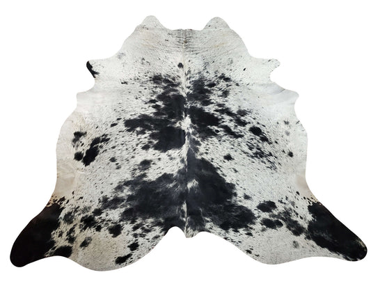 This is a very beautiful speckled cowhide rug that is larger and more unique than similar rugs and soft and good for walking and touching.
