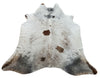 Searching for cowhide rugs online? this stunning salt and pepper Canada will stun your living room. 