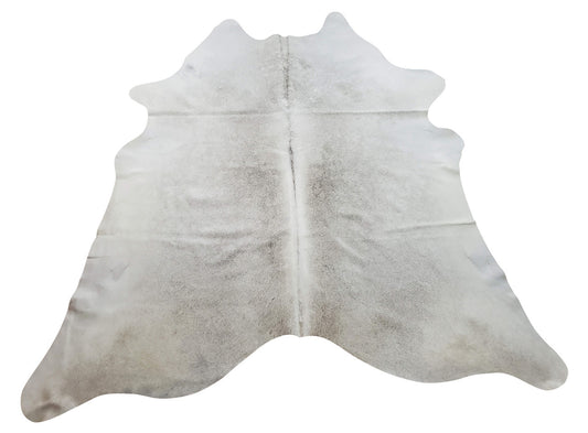 This light tan cowhide rug is mix of white with some grey in large size great for office or living room decor this is cow hide has rare natural marking
