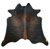 Immerse yourself in absolute comfort with our dark brindle cowhide rugs! These sumptuously soft treasures bring an unmatched tactile experience to your feet as you step onto their supple surface each morning. Their plush texture offers warmth during colder seasons while remaining breathable year-round, creating an inviting environment for relaxation or social gatherings.