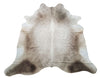 This long hair cowhide in mostly champagne with some white and real brand marking for your cottages or country house. 