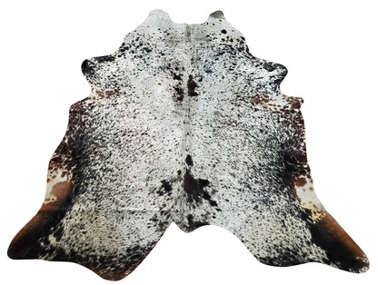 Extra large cowhide rug is great in pulling together the room, its like puzzle pieces in order, real cowhides are soft and adds the texture to all the spaces.