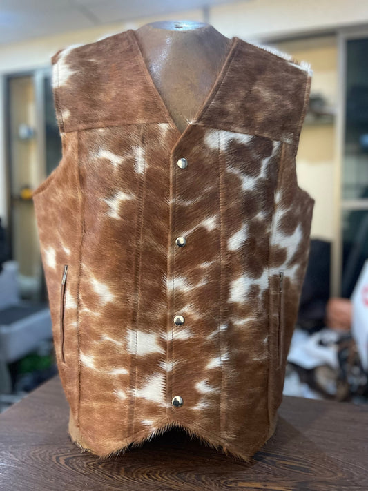Shop real brown white cowhide vest for men and women. Western cow skin vest made from genuine hair-on cow leather. Unique pattern, rugged edge.

