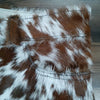 Stand out in real cow fur shorts for women. These brown white cowhide shorts feature hair-on-hide leather and authentic western appeal.

