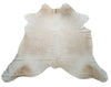 Searching for a cream cowhide rug for your living room, beige and white will pull all the colors and in your room together and pets love cowhide rugs also.
