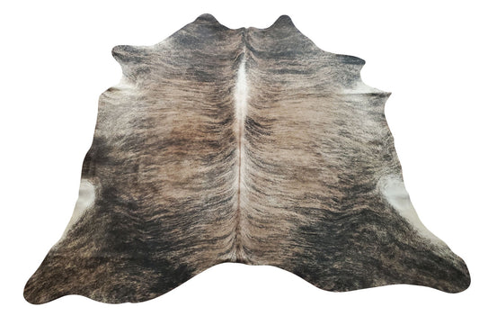 This stunning brindle cowhide rug will be an obsession, it pulls the living room together, more beautiful in person and the size is xl which is perfect.
