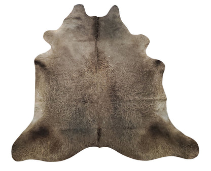 This dark grey cowhide rug with stunning tan on the edges is in style and loved by all the designer, its natural, hypo allergenic and very easy to clean. 