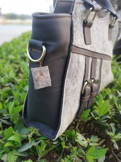 Grey hair on cowhide shoulder bag