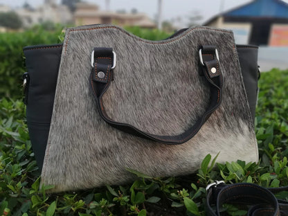 Grey hair on cowhide shoulder bag