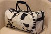 One of its kind these cowhide cross body bags are made on order, perfect for your week or any travels. 