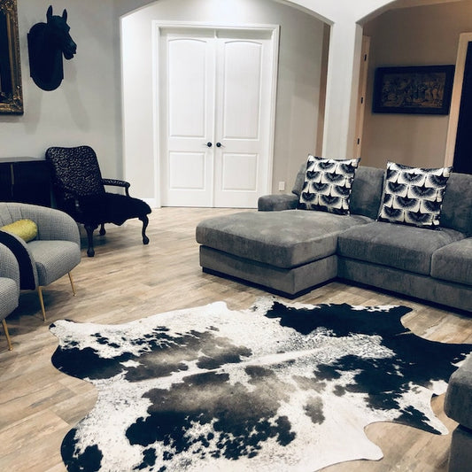 Experience pure luxury with our dark brown cowhide rugs. Soft and smooth to walk on, these are 100% real and natural. Plus, free shipping across Canada!
