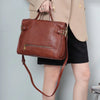 Top grain leather crossbody bag for women with adjustable strap, front zip pocket, and daily commuter storage