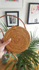 Our circle round wicker handbag straw and rattan purse are handwoven in Bali.  