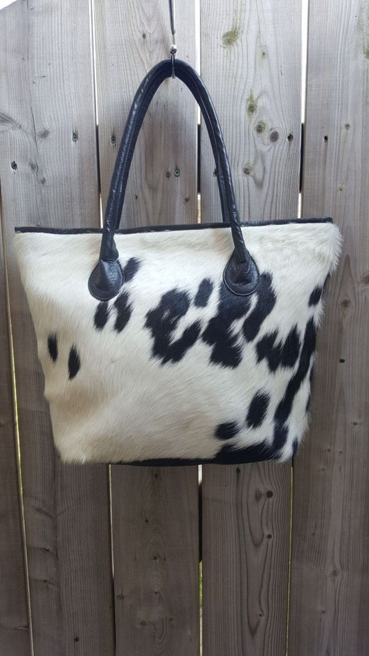 We have large selection of cowhide tote bag