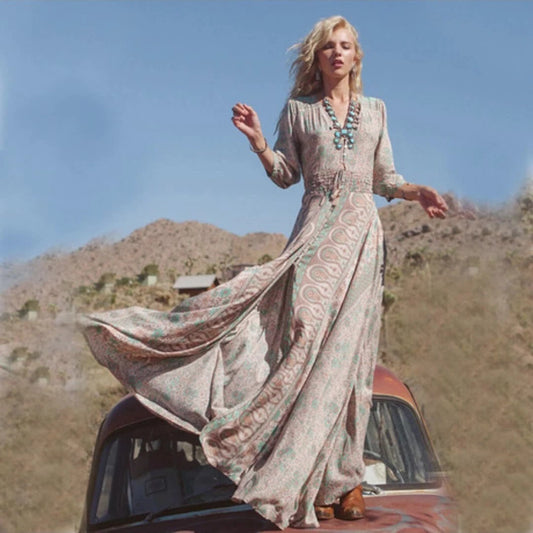 Floral maxi dress with turquoise tassel neckline