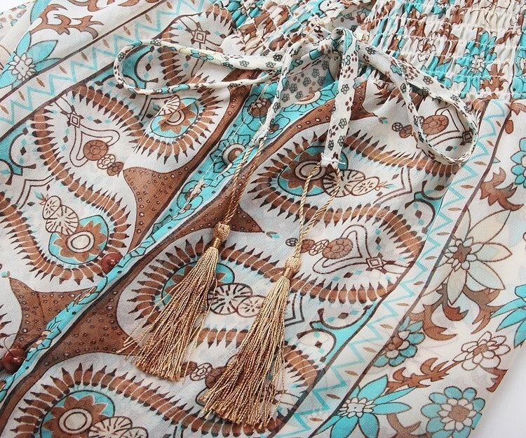 Floral maxi dress with turquoise tassel neckline