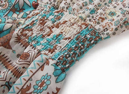 Floral maxi dress with turquoise tassel neckline