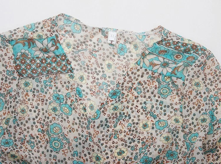 Floral maxi dress with turquoise tassel neckline
