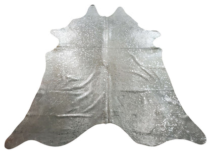 This metallic cowhide rug is dreamy, it is natural plus silver washed on pure white cow hide.