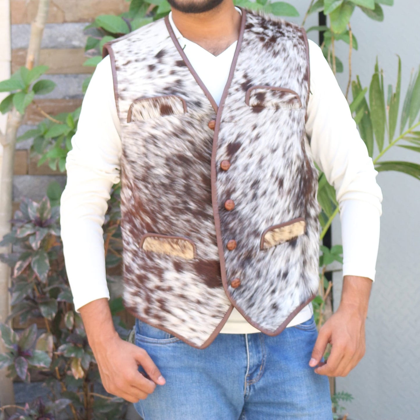 Cow fur vest for women made with authentic cowhide hair-on leather, blending rustic charm and modern flair for versatile seasonal styling.